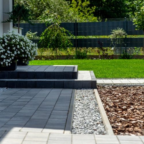 Entrance,To,The,House,Made,Of,Paving,Slabs,,Visible,Pebbles